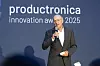 Dr. Reinhard Pfeiffer eröffnet die Jubiläumsfeier und blickt auf 50 Jahre productronica zurück.