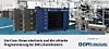 Blaues Industriegehäuse in einer Elektronikfertigung mit Maschinen und Fördertechnik im Hintergrund.