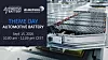 Großer Batteriemodulblock auf einer Messefläche neben einem Schild zum „Theme Day Automotive Battery“.