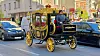 Elektromobilität statt Pferdestärken – gesehen im Wiener Realverkehr, während in der altehrwürdigen Hofburg das Wiener Motorensymposiums 2026 stattfand.