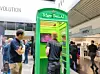 Telefonzelle mit KI-Charakteren auf der electronica 2024