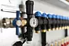 plumbing valve control system for underfloor heating. aerothermal installing
