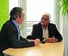 Kishor Patil (right side, here during the interview with Alfred Vollmer, editor-in-chief of the German magazine AUTOMOBIL-ELEKTRONIK): „I feel the emergence of an independent software Integrator as a partner for OEMs and Tier1s will be more prominent. We believe that is where KPIT has its strength.“