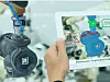 iot industry 4.0 concept,industrial engineer using smart tablet with augmented mixed with virtual reality technology to monitoring machine in real time.Smart factory use Automation robot arm