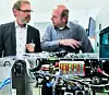 Martin Dimpfl, Leiter Electronic Enginee- ring im Mühlbauer- Unternehmensbe- reich Automation, (rechts) zeigt Martin Bauer (Beckhoff Re- gensburg) eines der vier Signal-Distributi- on-Boards mit den Steckmodulen: „Wir werden sukzessive alle Maschinen ab Stückzahl 10 pro Jahr auf die EJ-Klemmen umrüsten. Beckhoff Automation