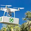 Unmanned,Aircraft,System,(uav),Quadcopter,Drone,Carrying,Package,With,Food
